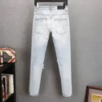 Amiri MX1 Distressed Skinny Jeans Light Wash - Image 2