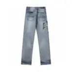 Amiri Straight Leg Logo Appliquéd Embroidered Distressed Jeans Light Blue - Image 2