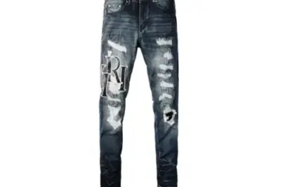 Amiri Varsity Ripped Skinny Jeans Light Gray
