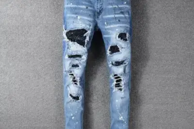 Amiri Ripped Jeans Fade Blue