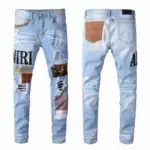 Amiri MX1-style Ripped Jeans Fade Blue
