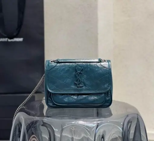 533037-22X16.5X12cm-YG-9-1_1228261-e1754548161205-510x466 YSL Niki Baby Bag Calfskin Teal - Image 1