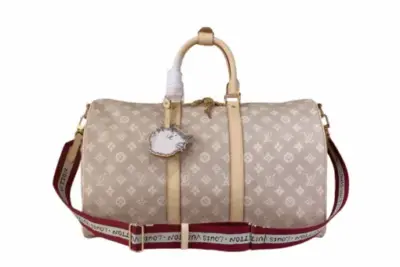 LV Keepall Bandoulière Monogram Canvas Cat Bag charm