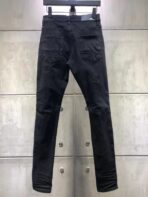 AMIRI Black MX1 Distressed Stretch-Denim Jeans With Leather Patches - Image 2
