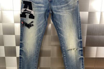 Amiri Varsity Patch Distressed Skinny Jeans Blue Indigo Wash