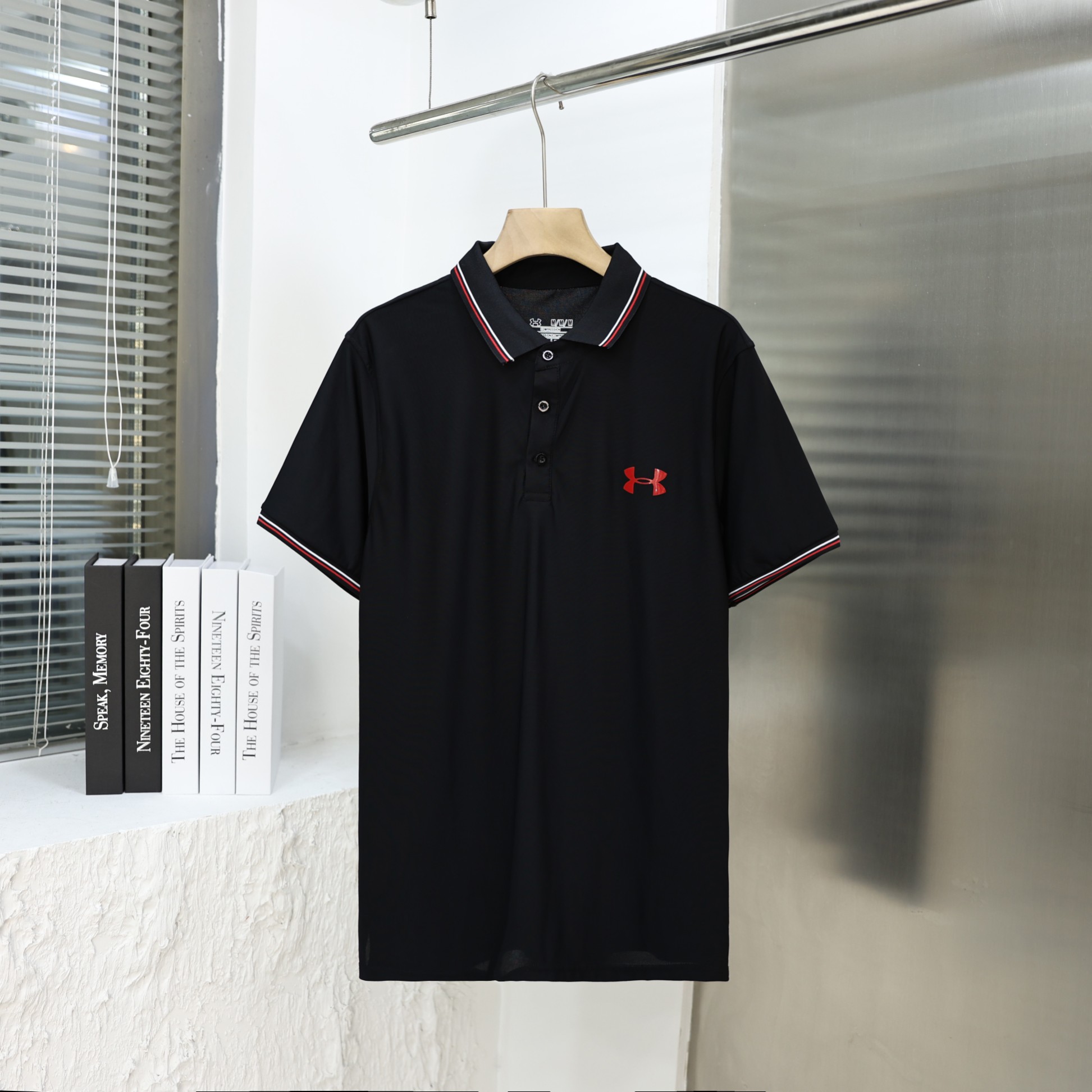 a1713152219953_8405 Under Armour Polo T-shirt Black - Image 1