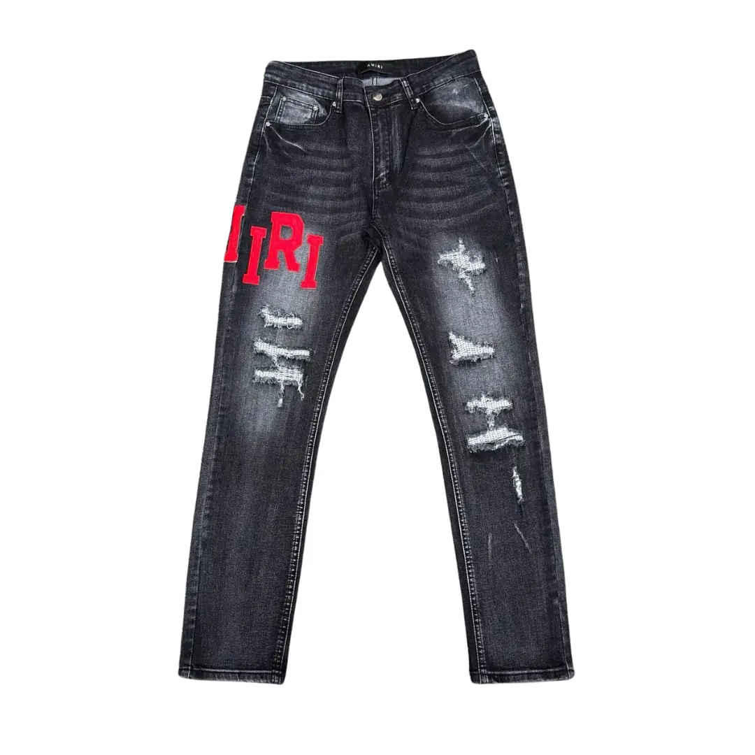 Deluxeside-2026-04-20T175927.854 Amiri Denim Jeans Ripped With Red Logo Design - Image 1