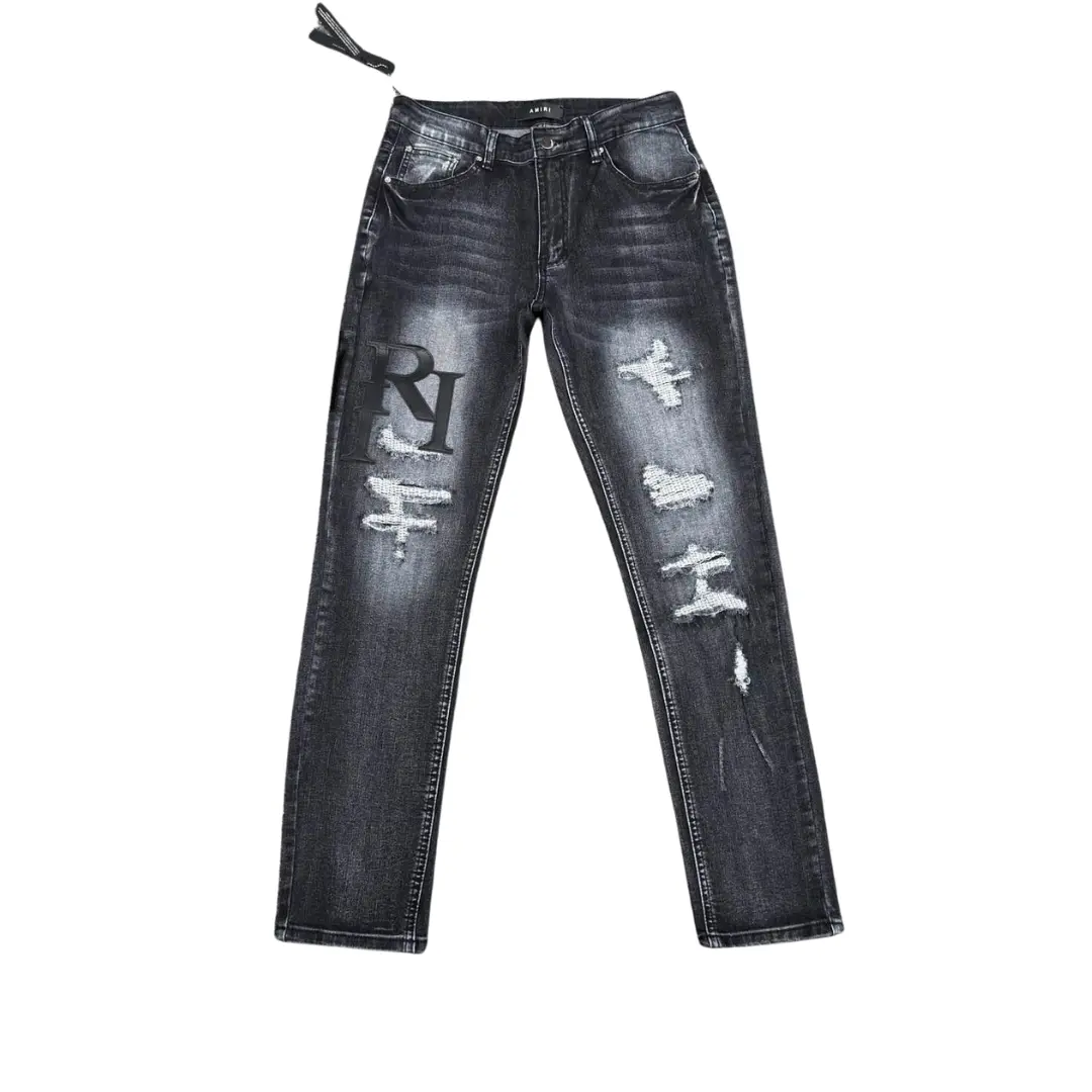Deluxeside-2026-04-20T180028.948 Amiri Denim Jeans Ripped With Logo Design - Image 1